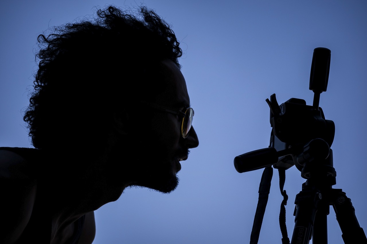 Photographer, silhouette, camera — Fraud defense built on document fraud detection AI